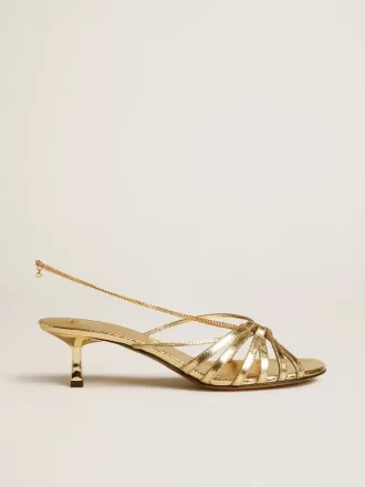 Sandali con tacco basso Nico in pelle metallizzata dorata Sandali con tacco basso Nico in pelle metallizzata dorata