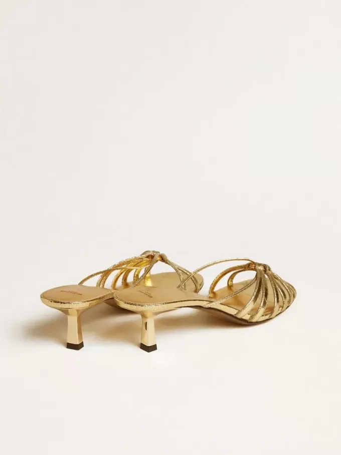 Sandali con tacco basso Nico in pelle metallizzata dorata