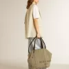 Sandali con tacco basso Nico in pelle metallizzata dorata