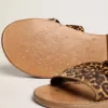 Sandali piatti da donna Margaret in pelle di pony con stampa leopardata Sandali piatti da donna Margaret in pelle di pony con stampa leopardata