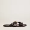 Sandali piatti da donna Margaret in pelle nera rivestita in resina Sandali piatti da donna Margaret in pelle nera rivestita in resina