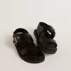 Sandalo Lucy da donna in pelle nera lucida con fibbia in metallo dorato