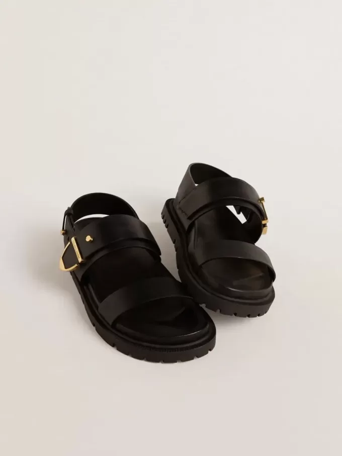 Sandalo Lucy da donna in pelle nera lucida con fibbia in metallo dorato