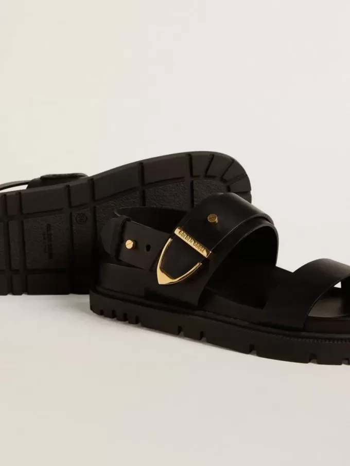 Sandalo Lucy da donna in pelle nera lucida con fibbia in metallo dorato