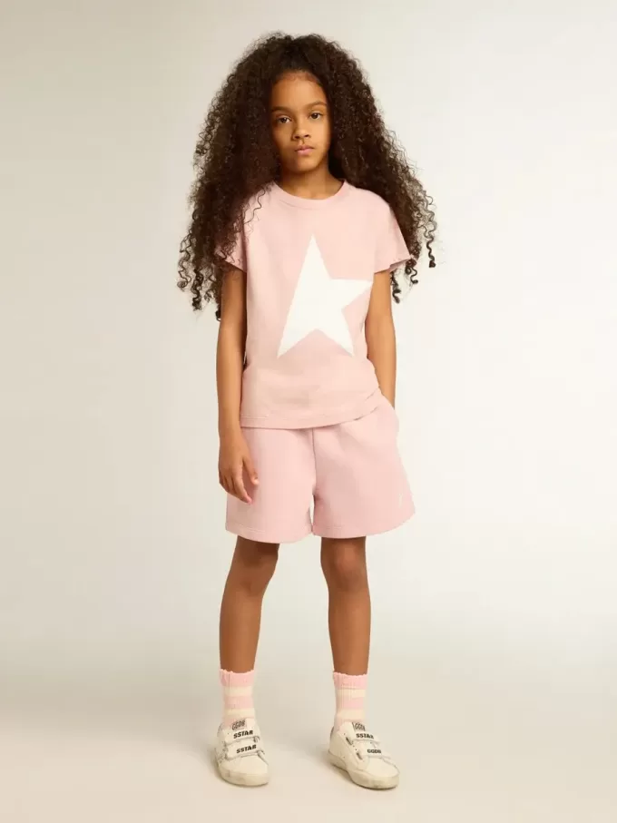 Shorts da bambina rosa con stella bianca Shorts da bambina rosa con stella bianca