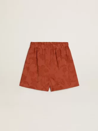 Shorts da donna in jacquard rosso mattone con motivo floreale marino