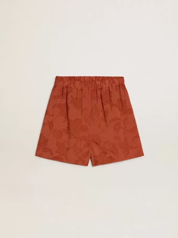Shorts da donna in jacquard rosso mattone con motivo floreale marino