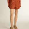 Shorts da donna in jacquard rosso mattone con motivo floreale marino