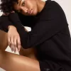 Shorts da donna neri con stella tono su tono
