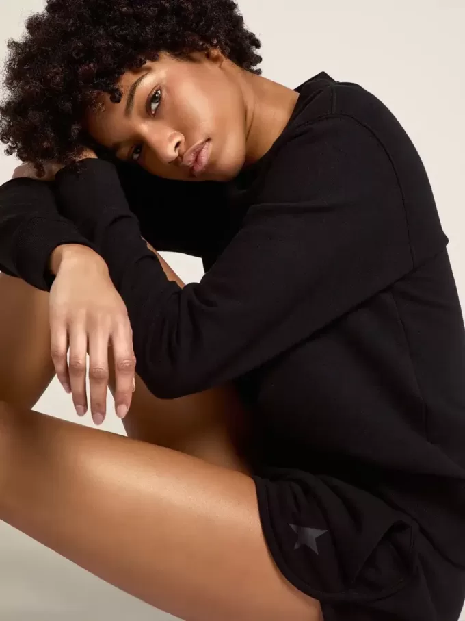 Shorts da donna neri con stella tono su tono
