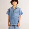 Shorts in denim per bambino con ricamo sul retro