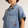 Shorts in denim per bambino con ricamo sul retro