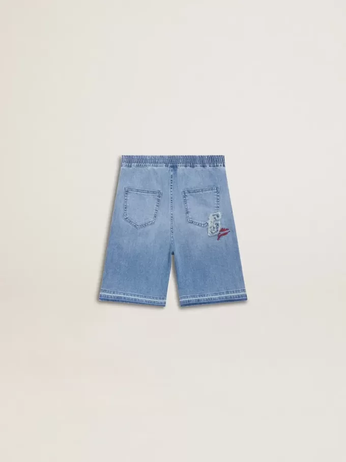 Shorts in denim per bambino con ricamo sul retro