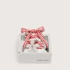 Skin “Playful” lacci a righe rosse e beige con charm applicati