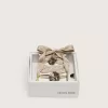 Skin “Vintage” beige lacci ricamati con charms applicati Skin “Vintage” beige lacci ricamati con charms applicati