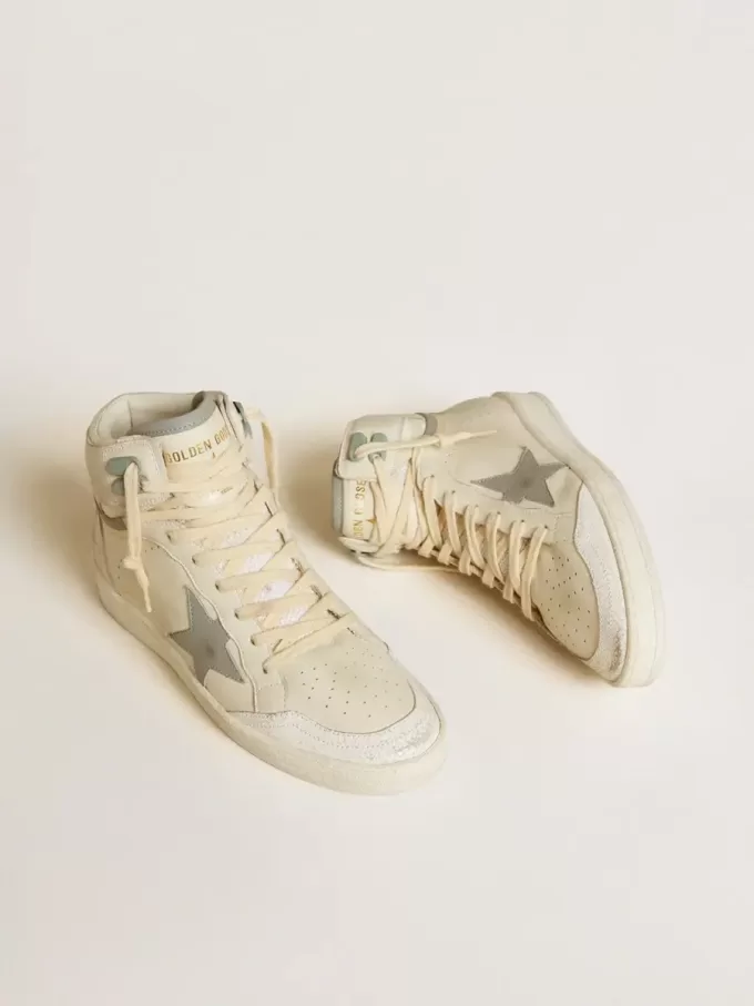Sky-Star da donna in pelle con stella in pelle azzurra e linguetta bianca sul tallone
