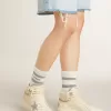 Sky-Star da donna in pelle con stella in pelle azzurra e linguetta bianca sul tallone