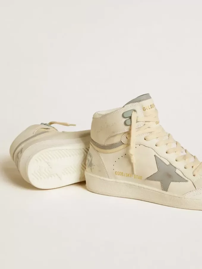 Sky-Star da donna in pelle con stella in pelle azzurra e linguetta bianca sul tallone