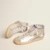 Slide da donna con tomaia in pelle laminata e glitter argento Slide da donna con tomaia in pelle laminata e glitter argento