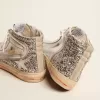 Slide da donna con tomaia in pelle laminata e glitter argento Slide da donna con tomaia in pelle laminata e glitter argento