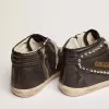 Slide da donna nere con borchie Slide da donna nere con borchie