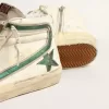 Slide in nappa beige con stella e flash in pelle laminata verde Slide in nappa beige con stella e flash in pelle laminata verde
