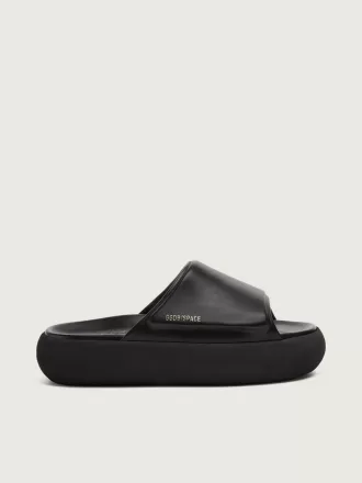Slip-on Space-Star Slide da donna in pelle nera