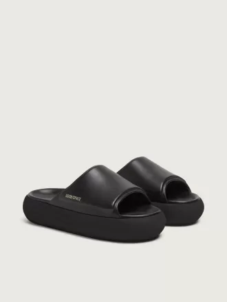 Slip-on Space-Star Slide da donna in pelle nera
