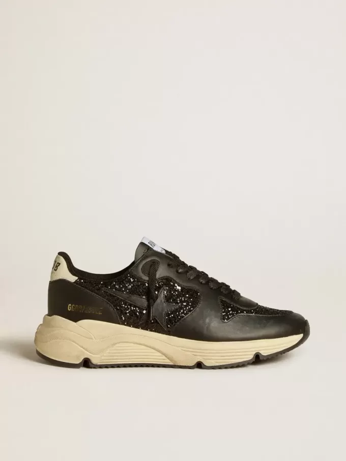 Sneaker da donna Running Sole in nero glitterato con stella in pelle e linguetta sul tallone in nabuk Sneaker da donna Running Sole in nero glitterato con stella in pelle e linguetta sul tallone in nabuk