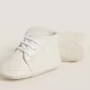Sneakers New Born in pelle bianca con stella traforata
