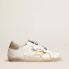 Sneakers Old School da donna con stella dorata in pelle laminata Sneakers Old School da donna con stella dorata in pelle laminata