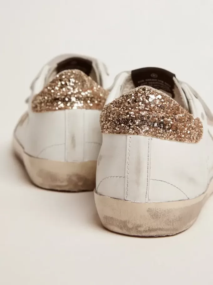 Sneakers Old School da donna con stella dorata in pelle laminata Sneakers Old School da donna con stella dorata in pelle laminata