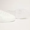 Sneakers Purestar bianche con linguetta sul tallone arancione fluorescente Sneakers Purestar bianche con linguetta sul tallone arancione fluorescente