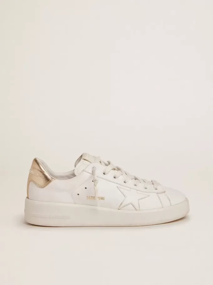 Sneakers Purestar da donna con linguetta dorata sul tallone Sneakers Purestar da donna con linguetta dorata sul tallone