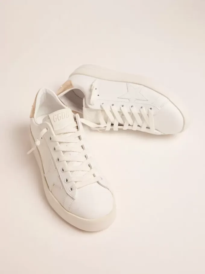Sneakers Purestar da donna con linguetta dorata sul tallone Sneakers Purestar da donna con linguetta dorata sul tallone
