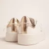 Sneakers Purestar da donna con linguetta dorata sul tallone Sneakers Purestar da donna con linguetta dorata sul tallone