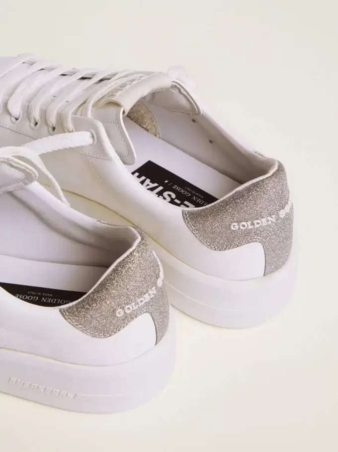 Sneakers Purestar da donna con linguetta sul tallone argentata glitterata Sneakers Purestar da donna con linguetta sul tallone argentata glitterata