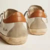Sneakers Super-Star da donna con stella in pelle scamosciata e linguetta marrone sul tallone Sneakers Super-Star da donna con stella in pelle scamosciata e linguetta marrone sul tallone