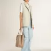 Stardan con stella e punta in pelle scamosciata beige e scritte e motivi su tutta la superficie Stardan con stella e punta in pelle scamosciata beige e scritte e motivi su tutta la superficie