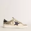 Stardan da donna in glitter platino con stella e linguetta sul tallone in pelle scamosciata blu scuro Stardan da donna in glitter platino con stella e linguetta sul tallone in pelle scamosciata blu scuro