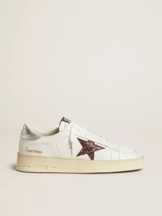 Stardan da donna in nappa con stella glitterata e linguetta sul tallone in pelle metallizzata Stardan da donna in nappa con stella glitterata e linguetta sul tallone in pelle metallizzata