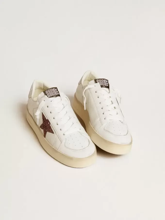 Stardan da donna in nappa con stella glitterata e linguetta sul tallone in pelle metallizzata Stardan da donna in nappa con stella glitterata e linguetta sul tallone in pelle metallizzata