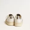 Stardan da donna in nappa con stella glitterata e linguetta sul tallone in pelle metallizzata Stardan da donna in nappa con stella glitterata e linguetta sul tallone in pelle metallizzata