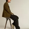 Stardan da donna in pelle nappa écru con stella glitterata dorata e linguetta sul tallone Stardan da donna in pelle nappa écru con stella glitterata dorata e linguetta sul tallone