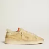 Stardan in pelle scamosciata beige con tallone in pelle e fodera in shearling Stardan in pelle scamosciata beige con tallone in pelle e fodera in shearling
