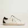 Super-Star da donna con stella dorata e tallone nero glitterato