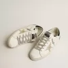 Super-Star da donna con stella dorata e tallone nero glitterato