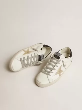 Super-Star da donna con stella dorata e tallone nero glitterato