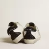 Super-Star da donna con stella dorata e tallone nero glitterato