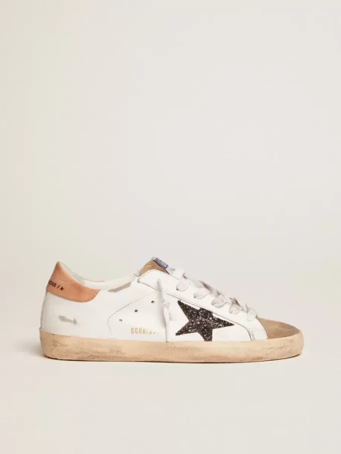 Super-Star da donna con stella glitterata nera e linguetta rosa sul tallone